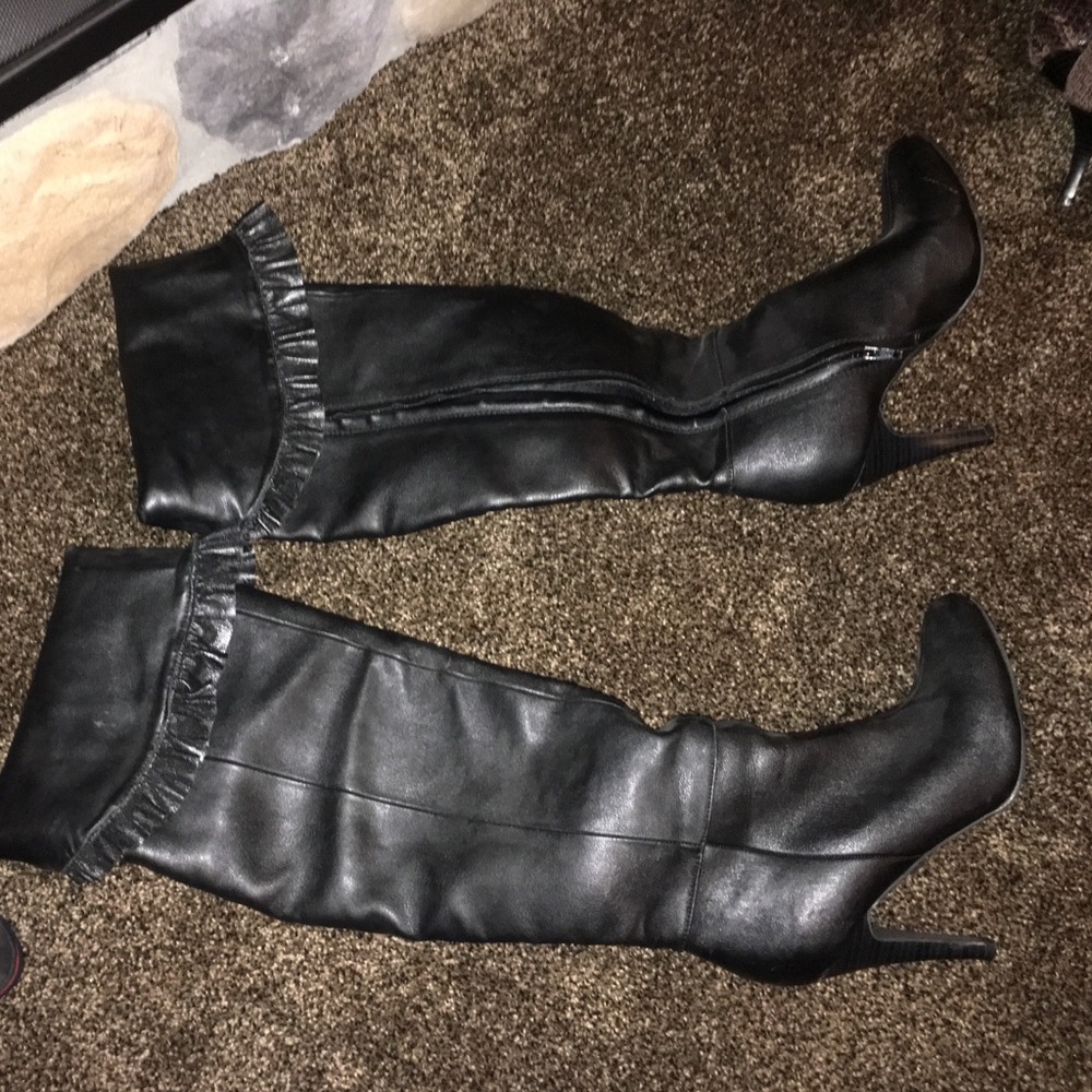 Tall black photo leather high-heeled boots