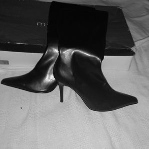 Knee high black stilleto boots