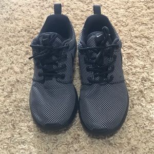 Black and gray Nikes