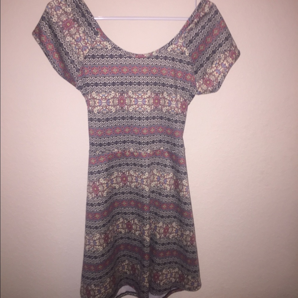 Medium dress with open back.