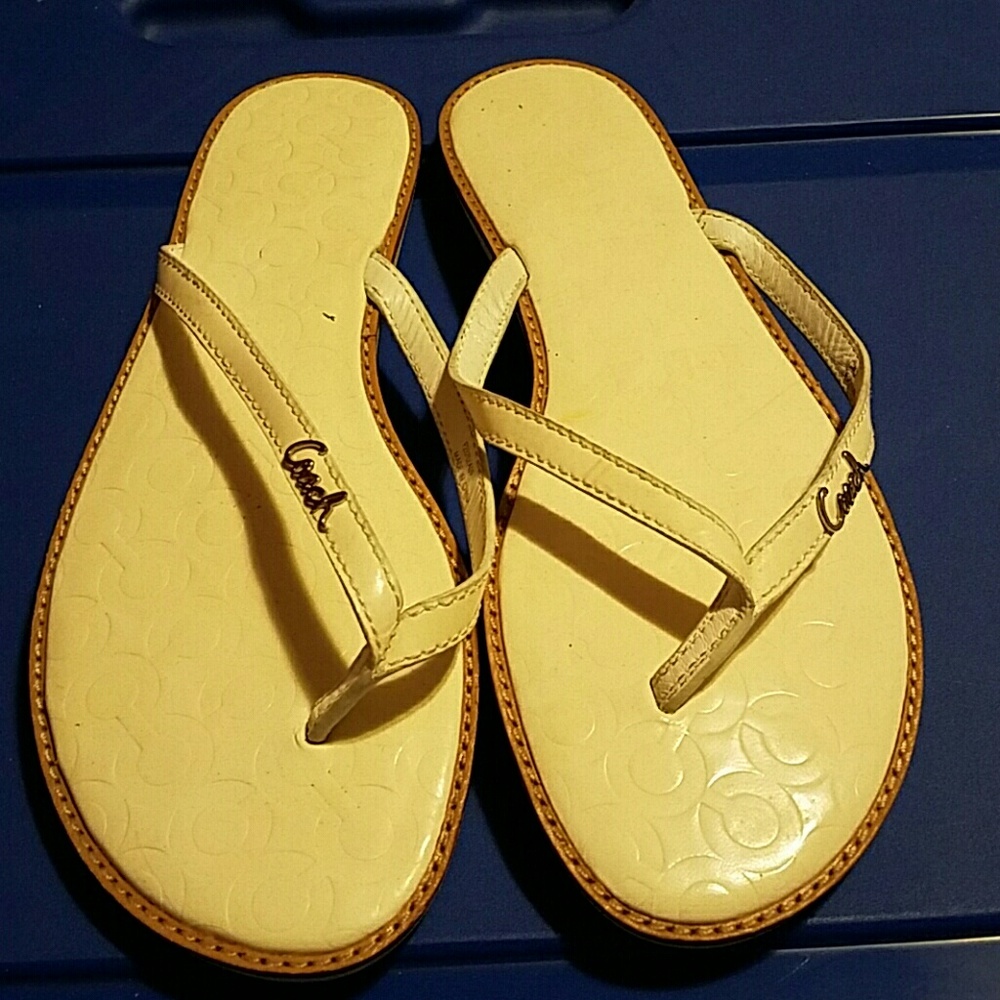 Coach flip flops.