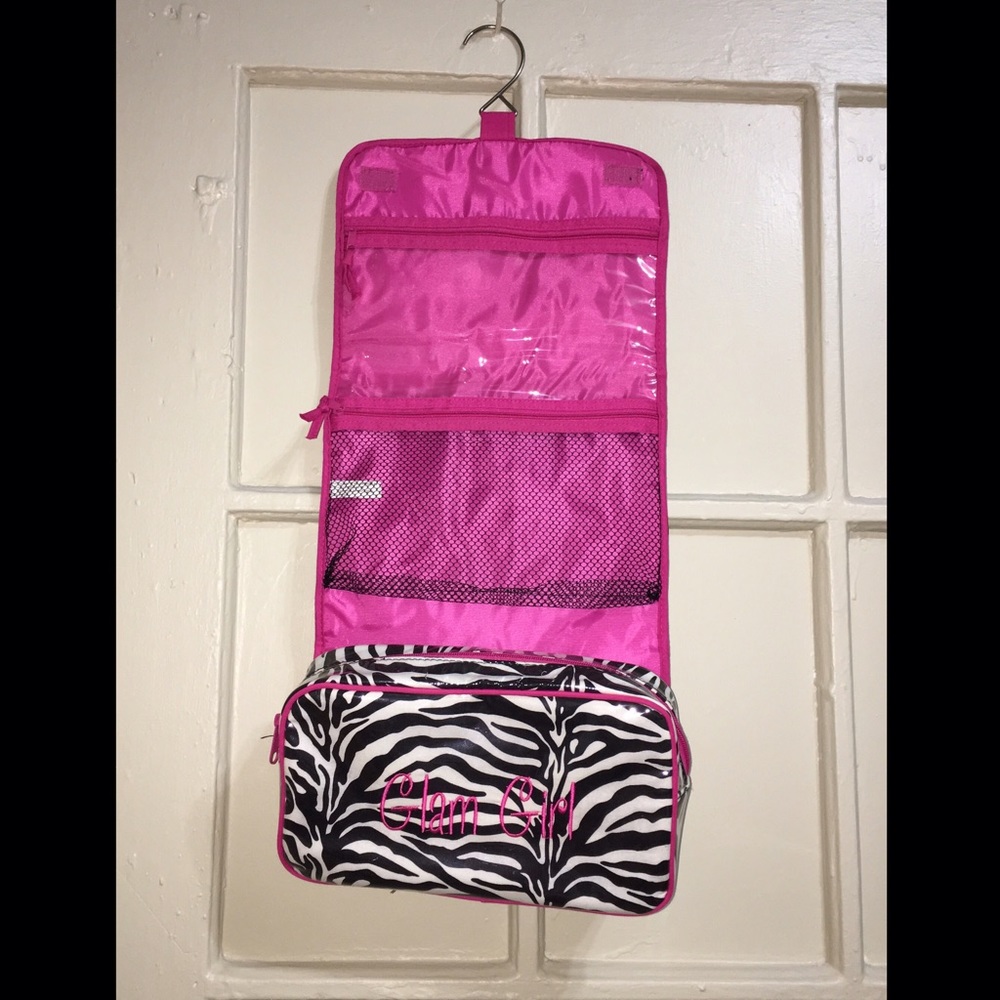 Pink Zebra print hanging toiletry bag.