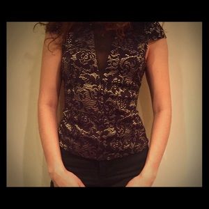 Black and silver patterned shirt with cutout back