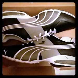 Black puma silver white shoes