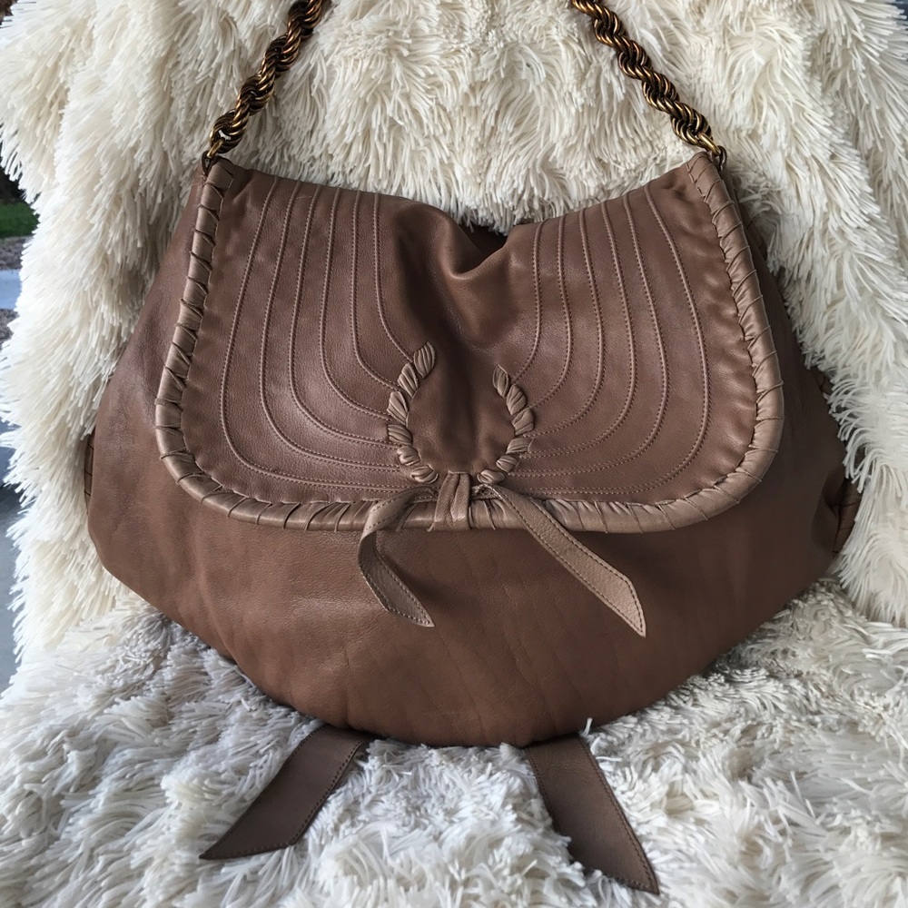 Nina Ricci horseshoe saddle bag