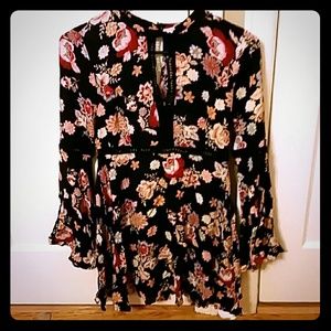 Flower dress with bell sleeves.