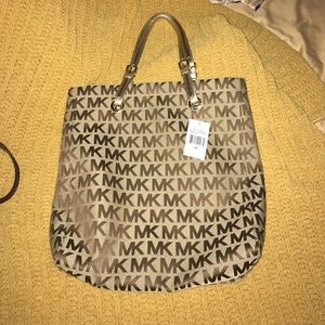 Tan and gold micheal kors shoulder bag