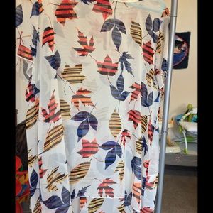 Beautiful leaf print blouse. New without tags.