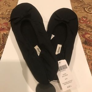 Black slippers from Soma