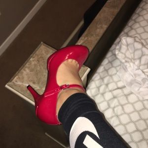 Glossy red classic heels