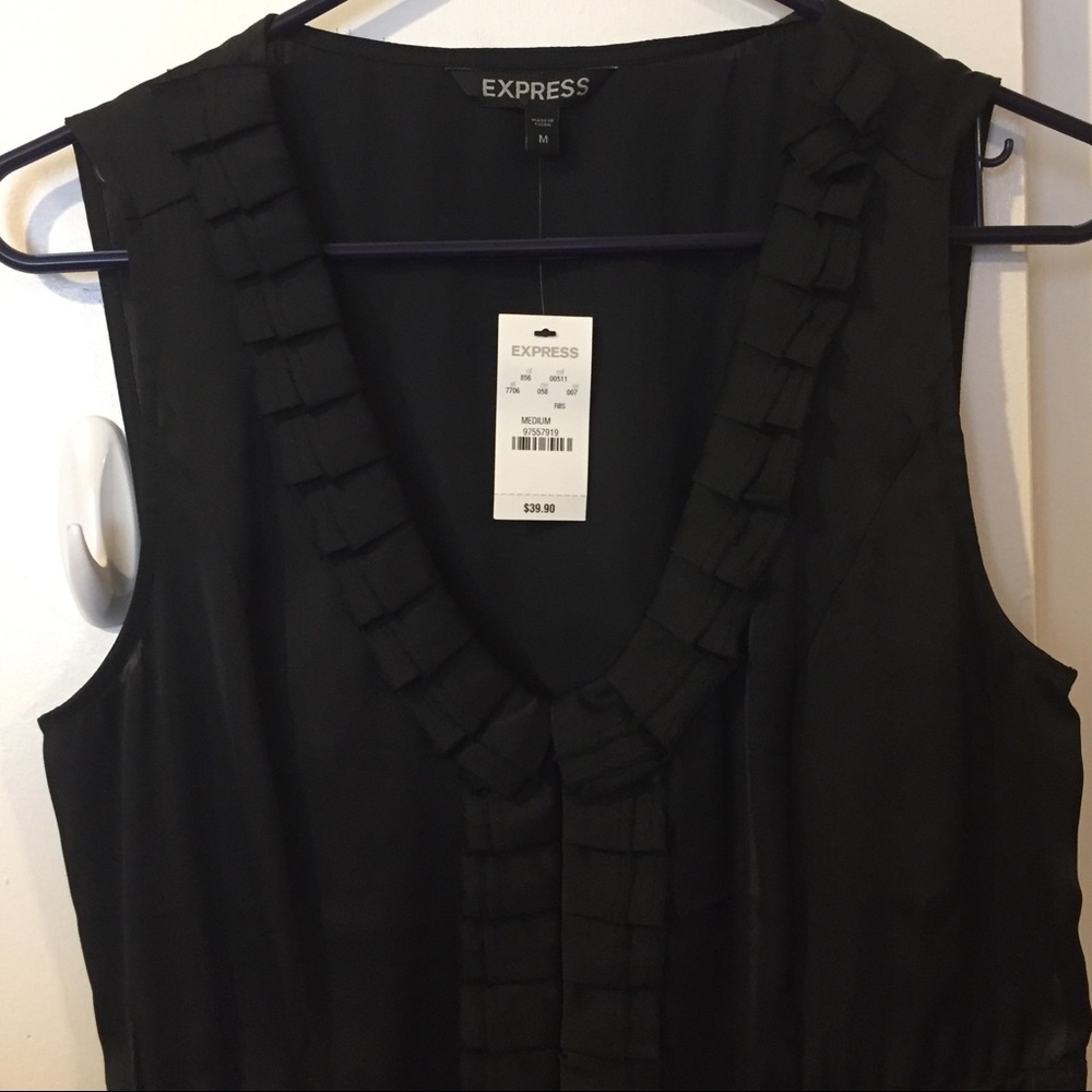 Express black ruffle blouse. New with tags