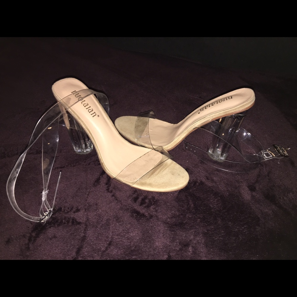 Clear strap heel sandals with silver button.