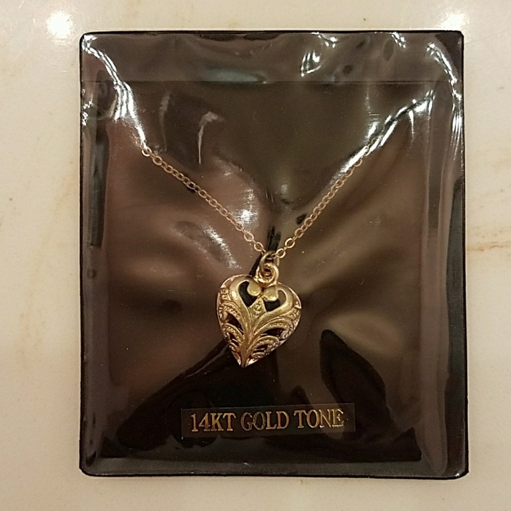 Gold heart necklace. NWT