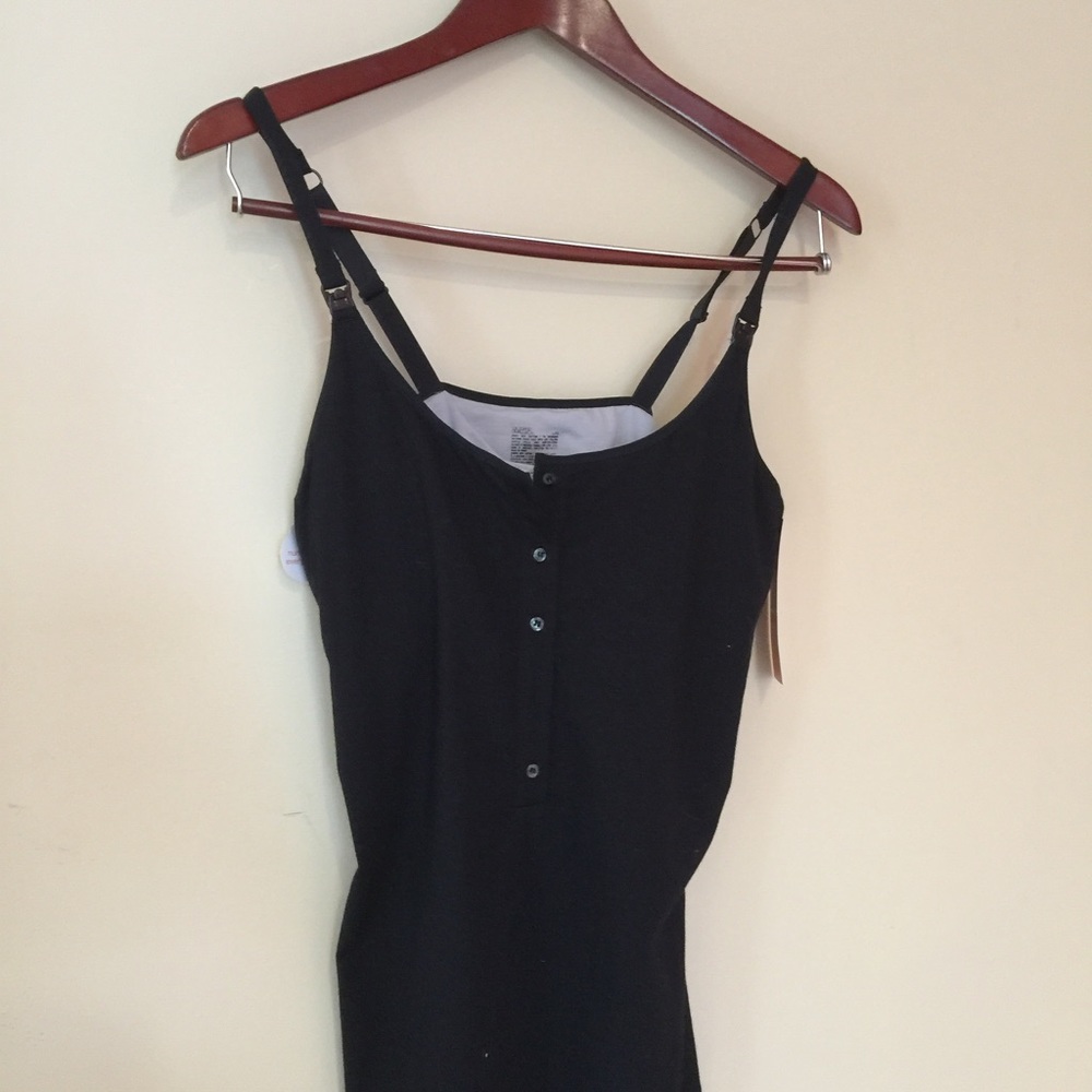 Bundle of Nursing tanks.