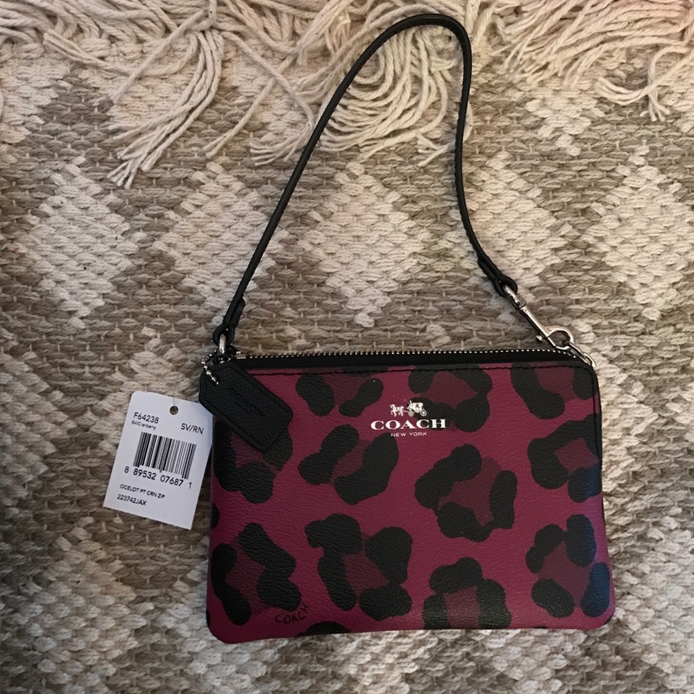 Cheetah print Coach wristlet
