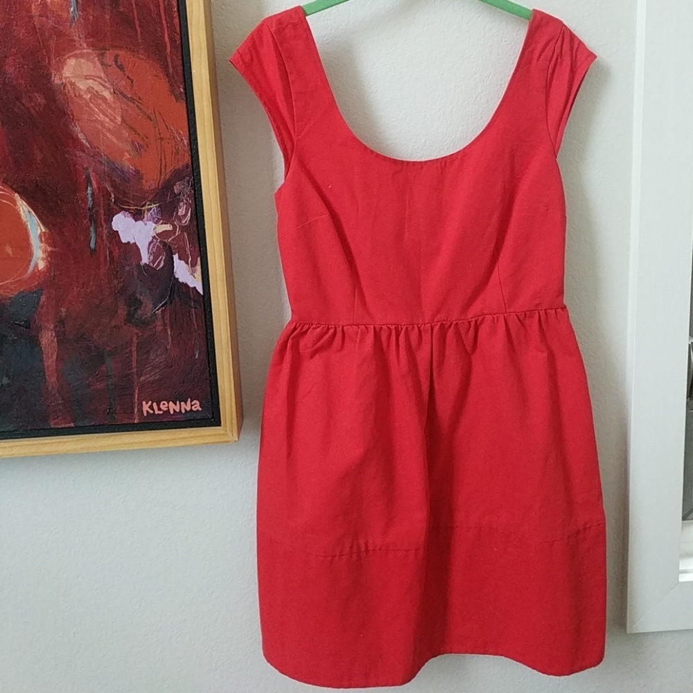Red empire-waist dress with a peek-a-boo back (AE)