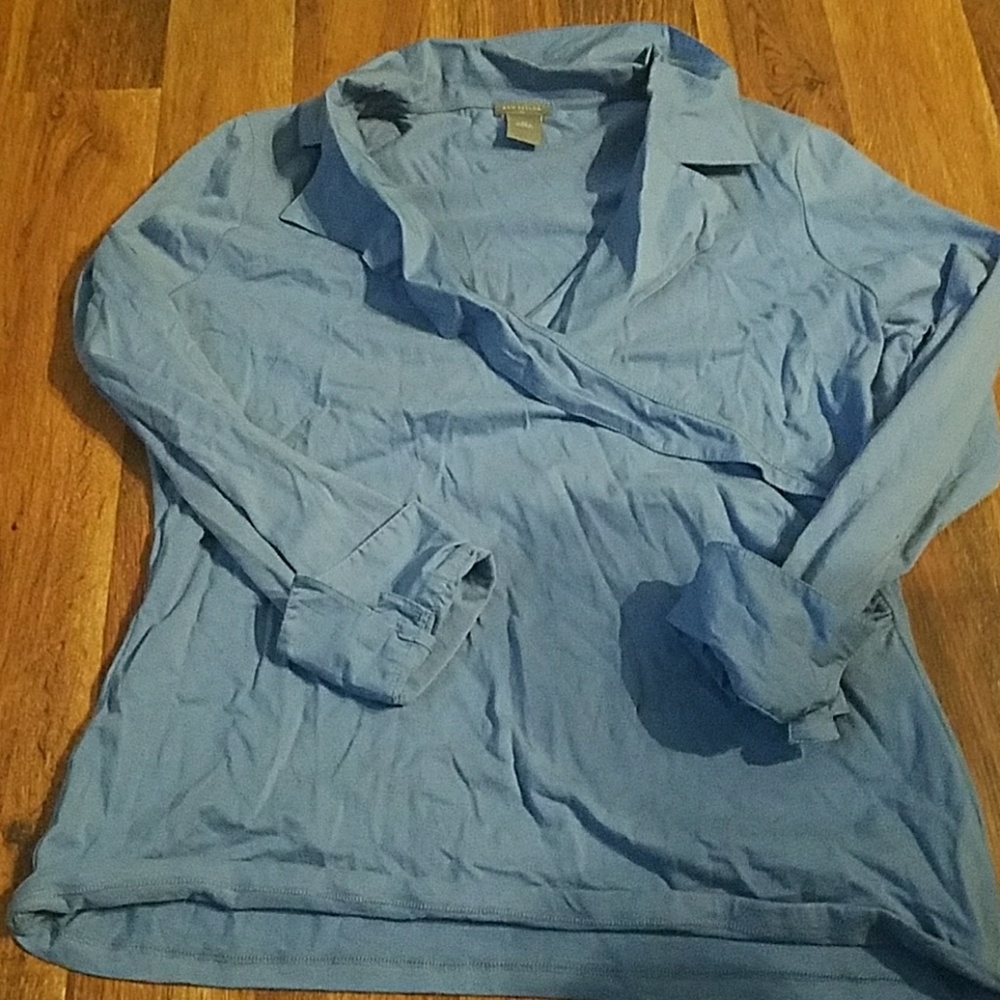 Universally flattering light blue faux wrap blouse