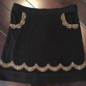 Gently worn black Anthropologie mini skirt size M