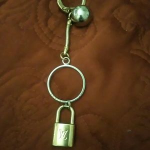 AUTH LV CHARMS