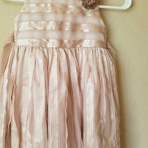 Dainty dress for a little girl.