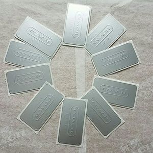 10 silver Coach stickers