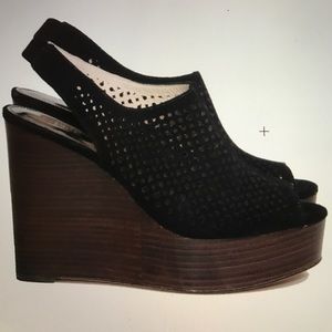 Black suede Coach wedges