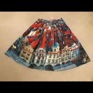 "Pretty Panoramic Midi Skirt."