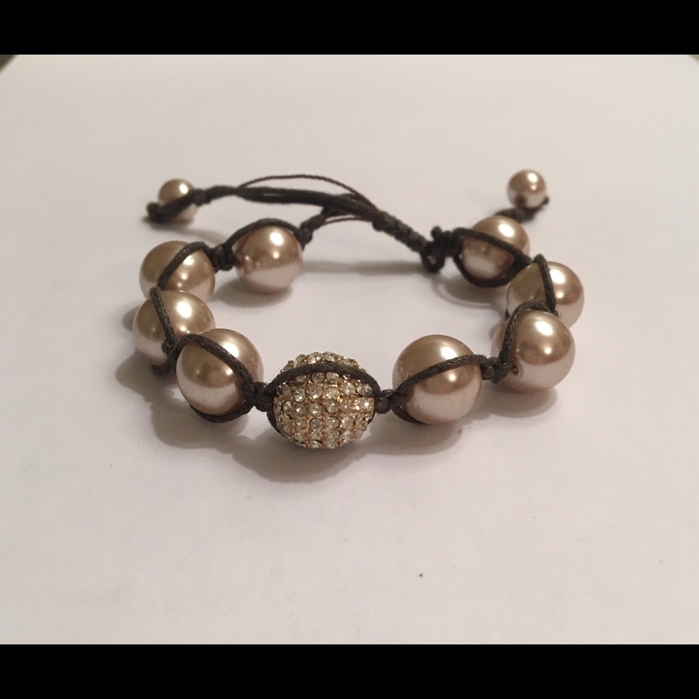 Gold costume pearl and cord adjustable bracelet