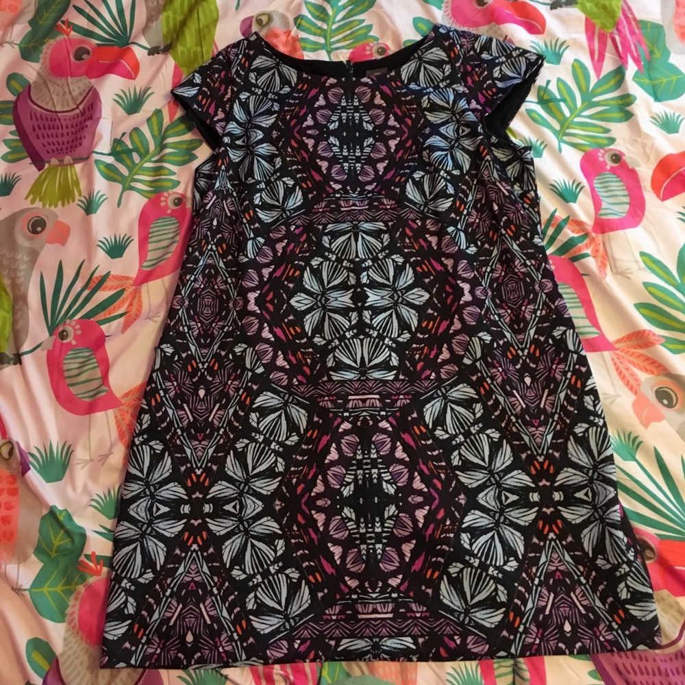 Flattering dress in easy to wear scuba fabric.