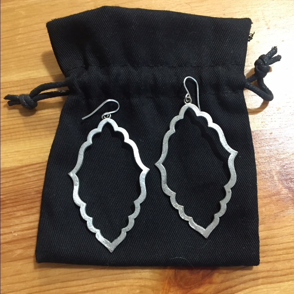 Silver shapely dangle earrings
