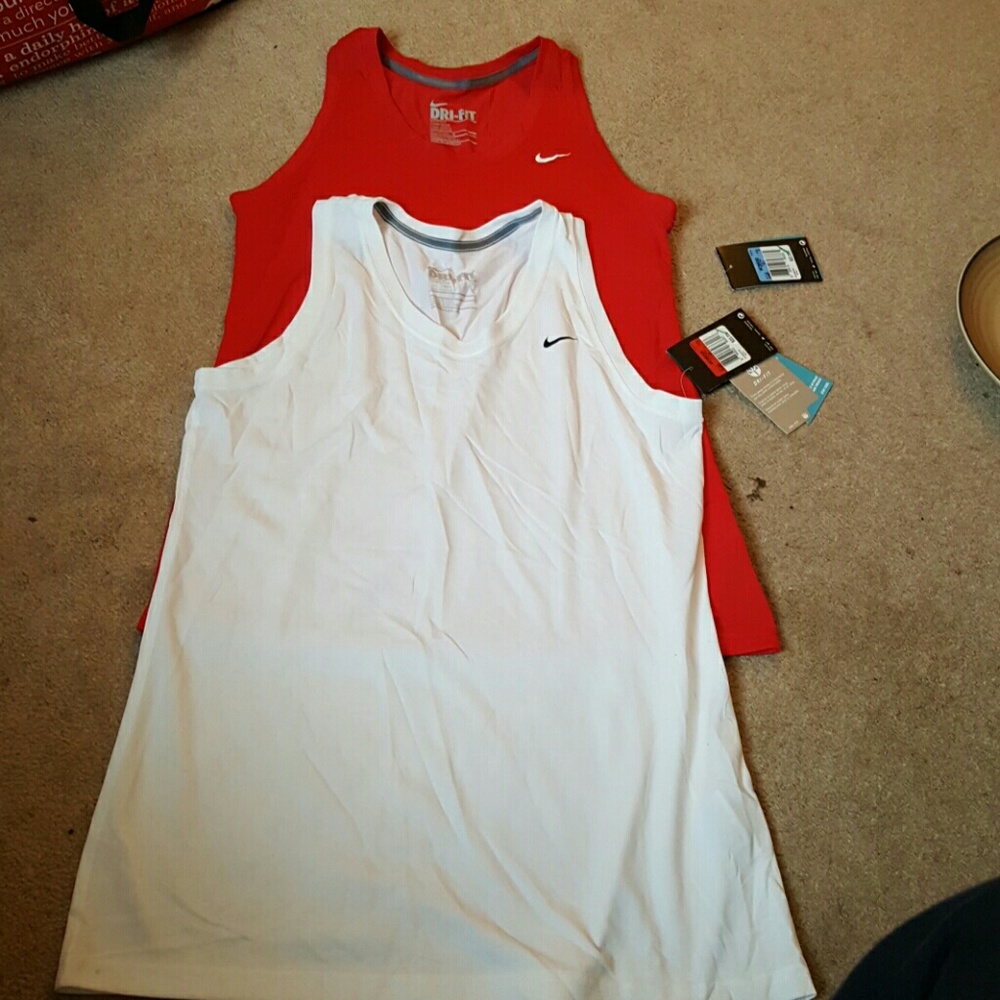 Nike tank tops, white one is a L and the red is M