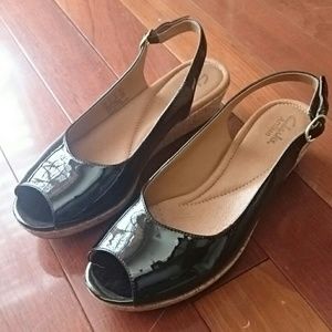 Peep toe black patent wedges by Clark