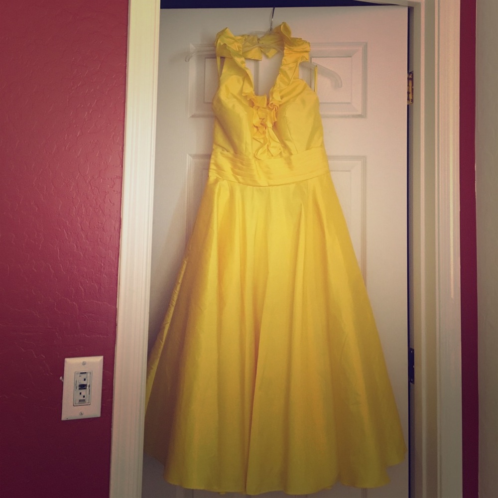 Backless yellow dress from Davids bridal
