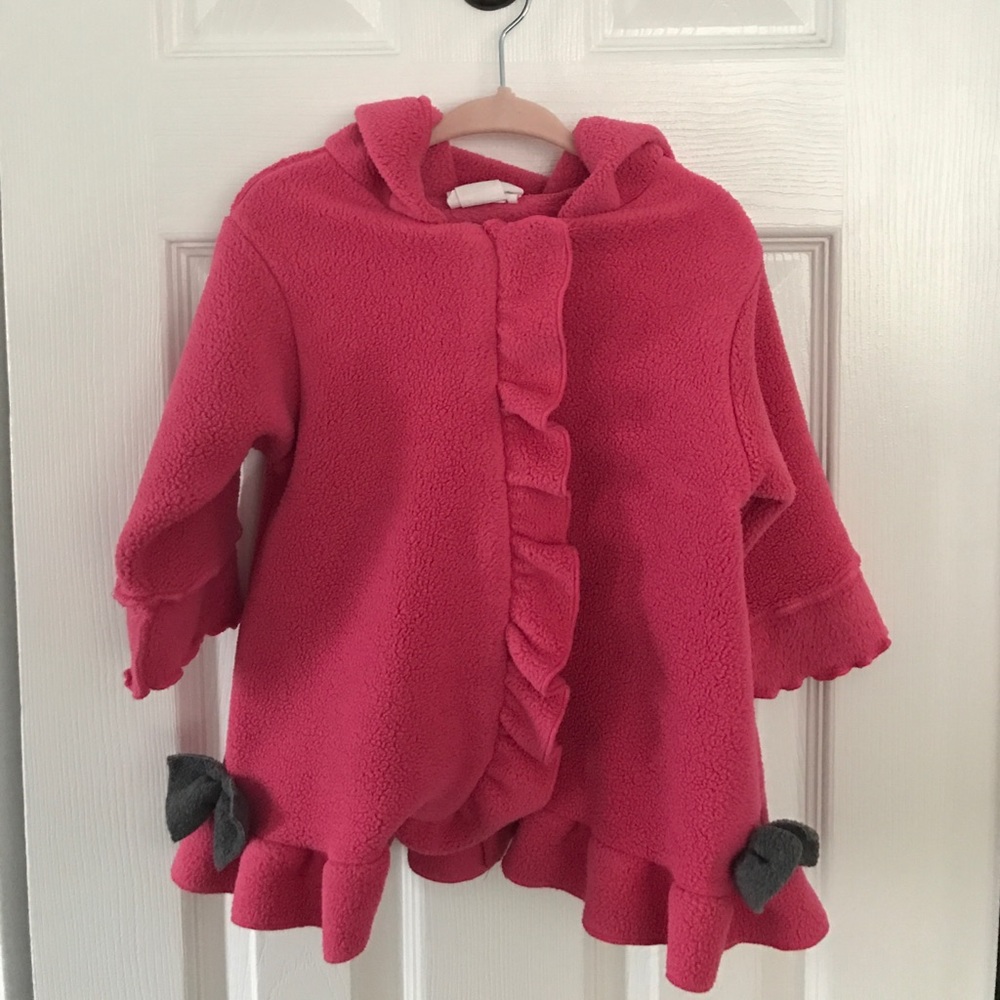 Adorable fleece ruffle hoodie. With bow on hood:)
