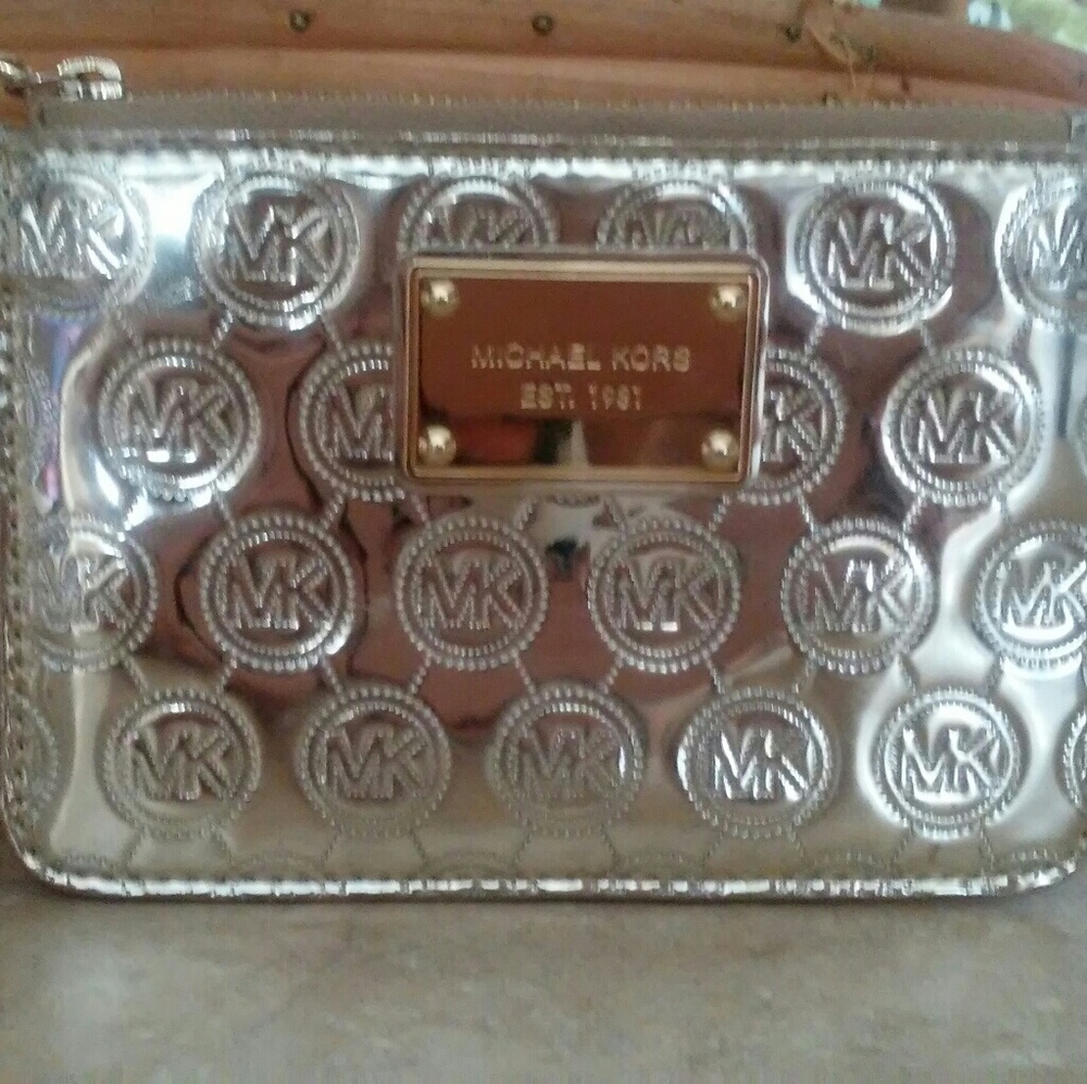 {Sold} Michael Kors Monogrammed Metallic Wristlet