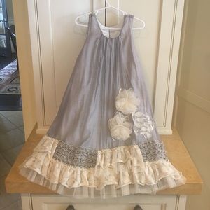 Little girls dress by Isabelle and Chloe.