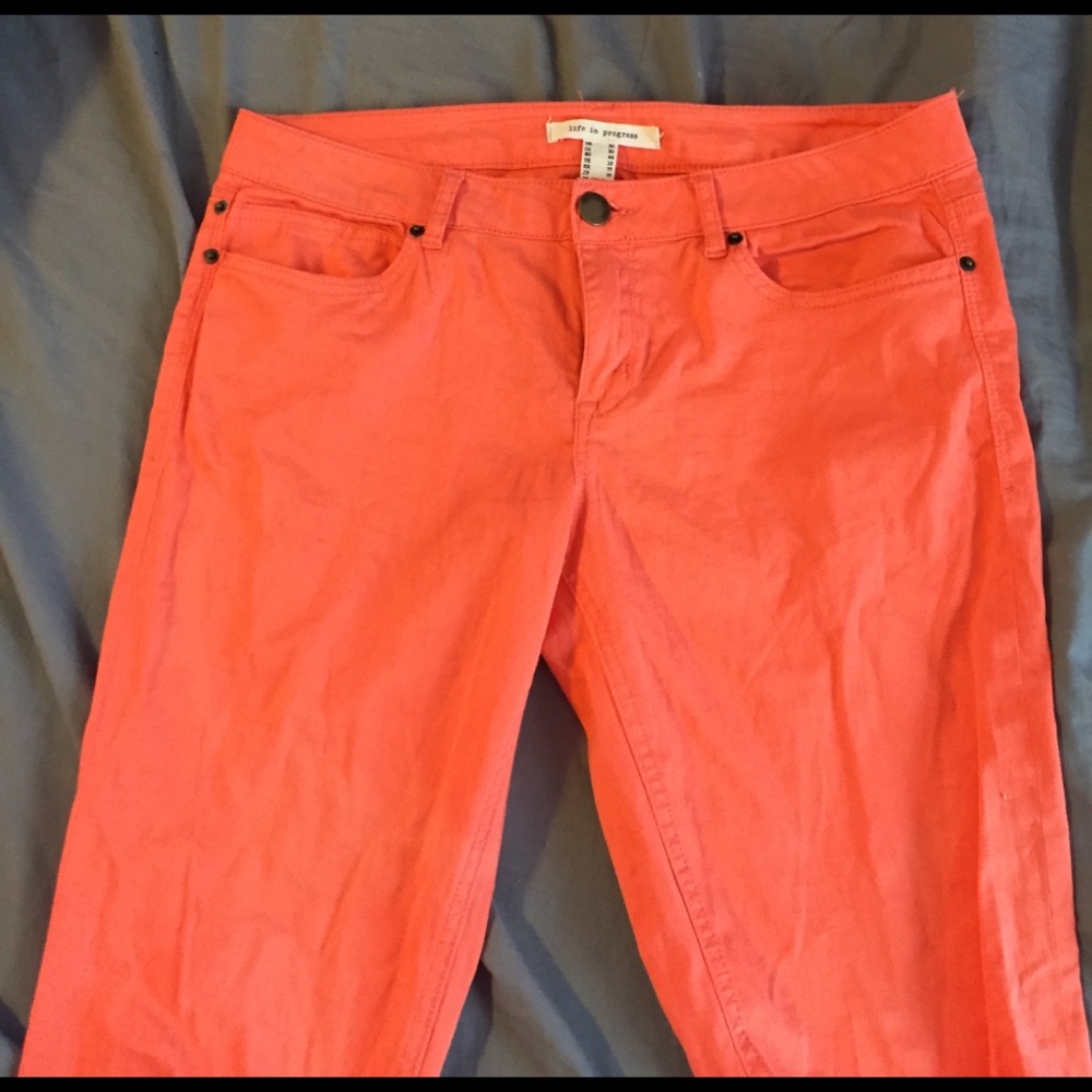 Bright orange skinny jeans