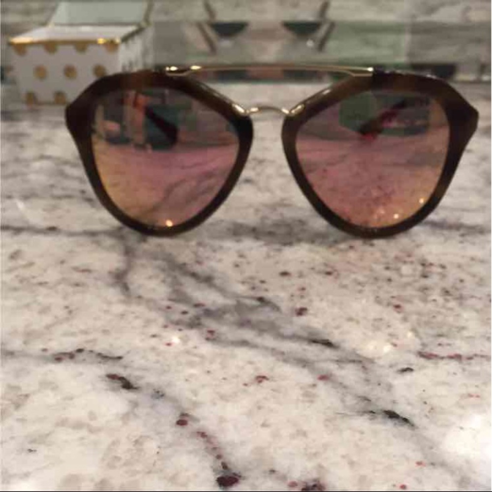 Prada sunglasses basically brand new.