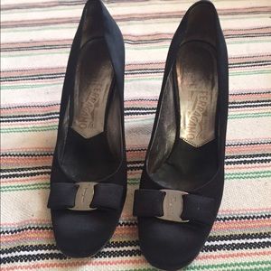 Salvatore Veragamo classic round toe satin pumps.
