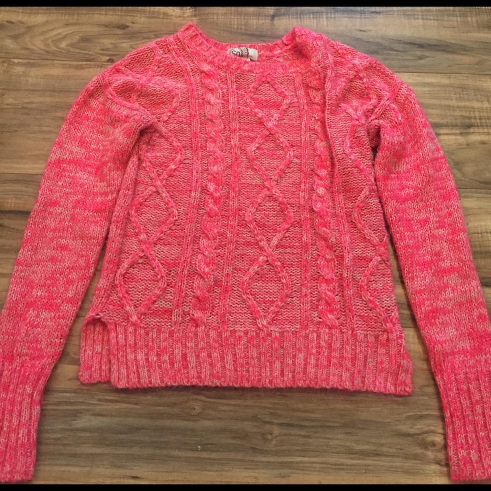 Bright pink knitted sweater