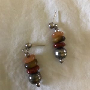 Silver, yellow, and red earrings