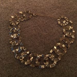large gold chain linked necklace