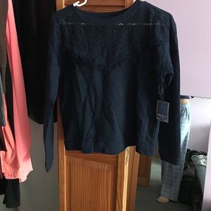 A blue long sleeve shirt