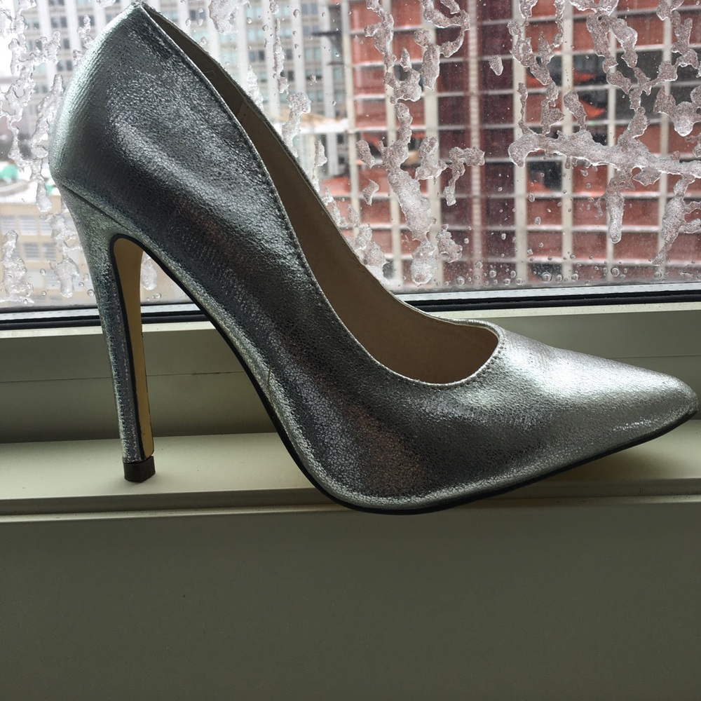 Michael Antonio silver pumps