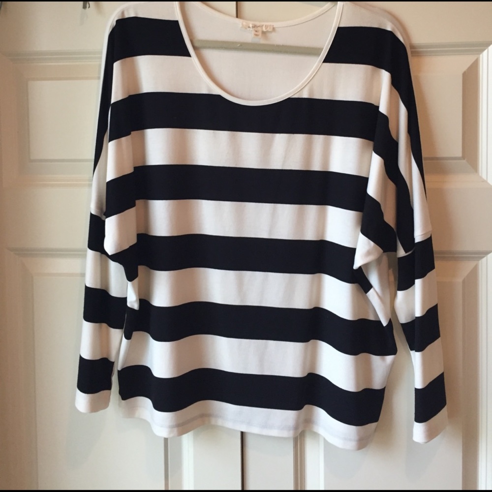 Black and cream striped shirt.
