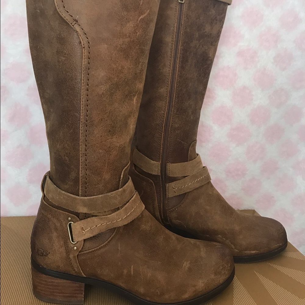UGG  
Women's Brown Mid-Calf Leather Boot.