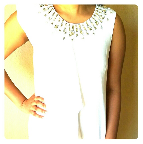 A chic white coctail dress - Picture 1 of 3