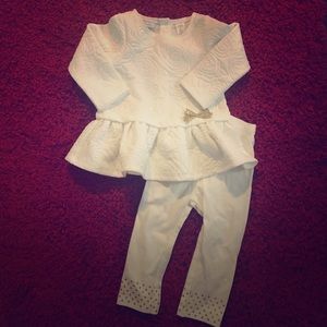 Cream outfit with gold accents