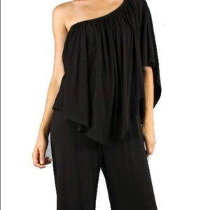 Black convertible jumpsuit .