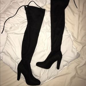 Thigh high black suede boots